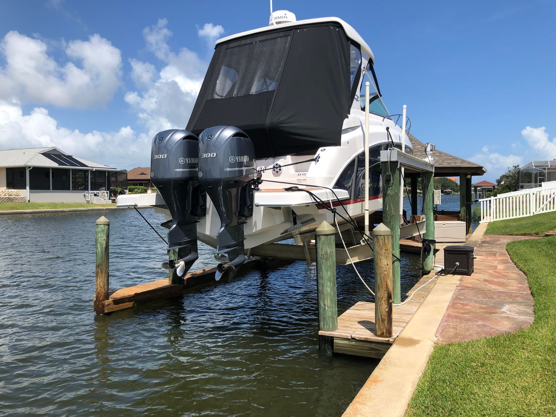 A boat is docked at a dock in the water.