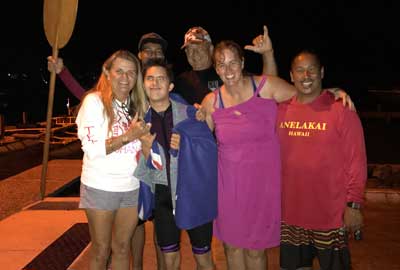 A group of people are posing for a picture together.