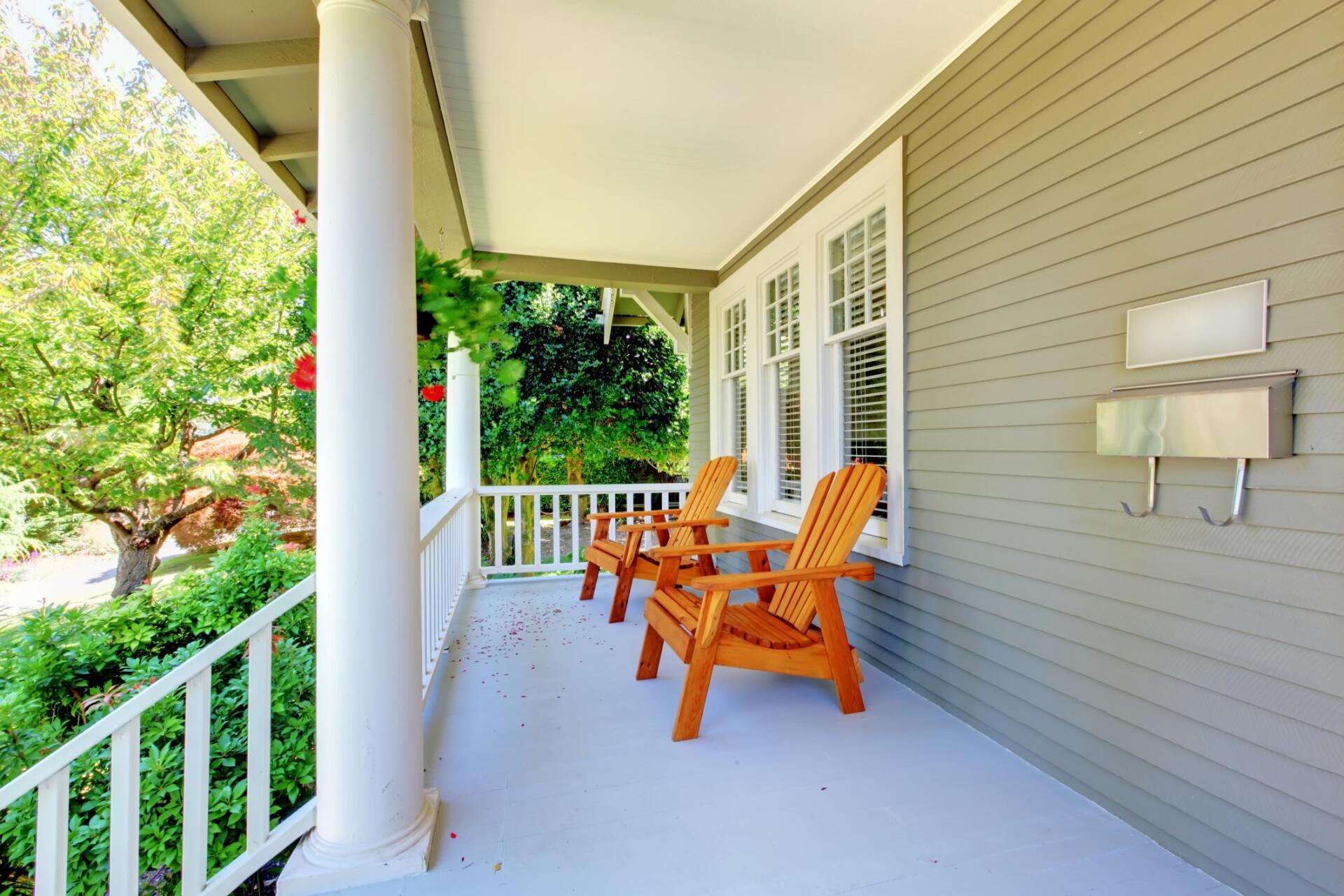 newly constructed porch with rocking chairs