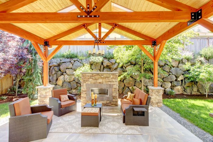 beautiful patio in Orange County with fireplace and furniture