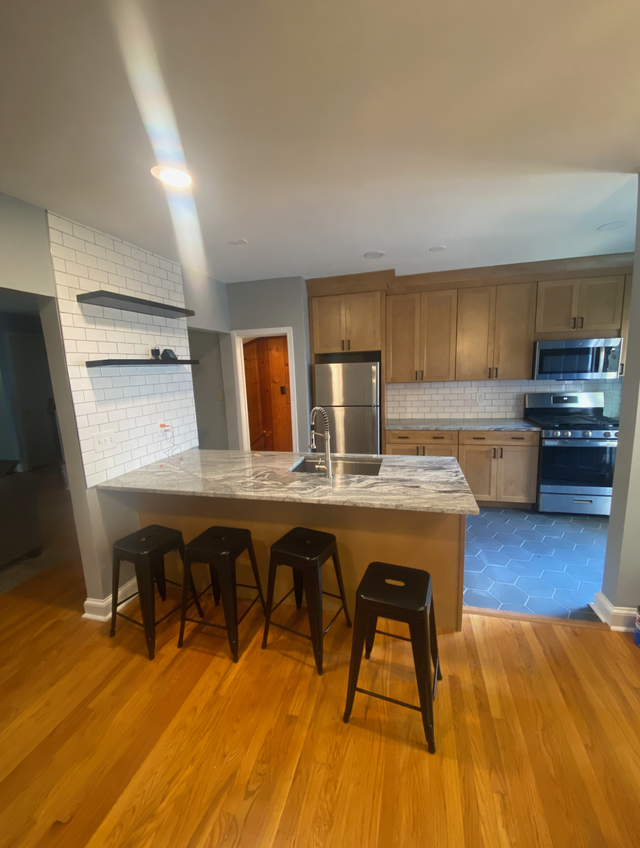 Towson open-concept kitchen with island seating, Towson, MD