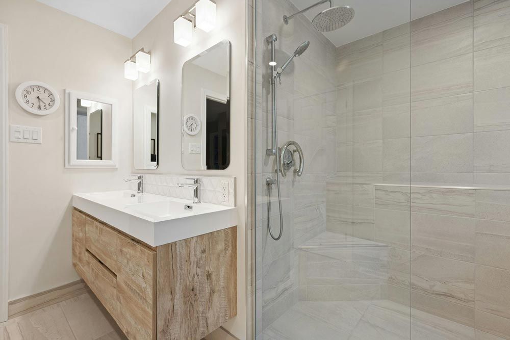 Modern bathroom with a wood vanity, double sinks