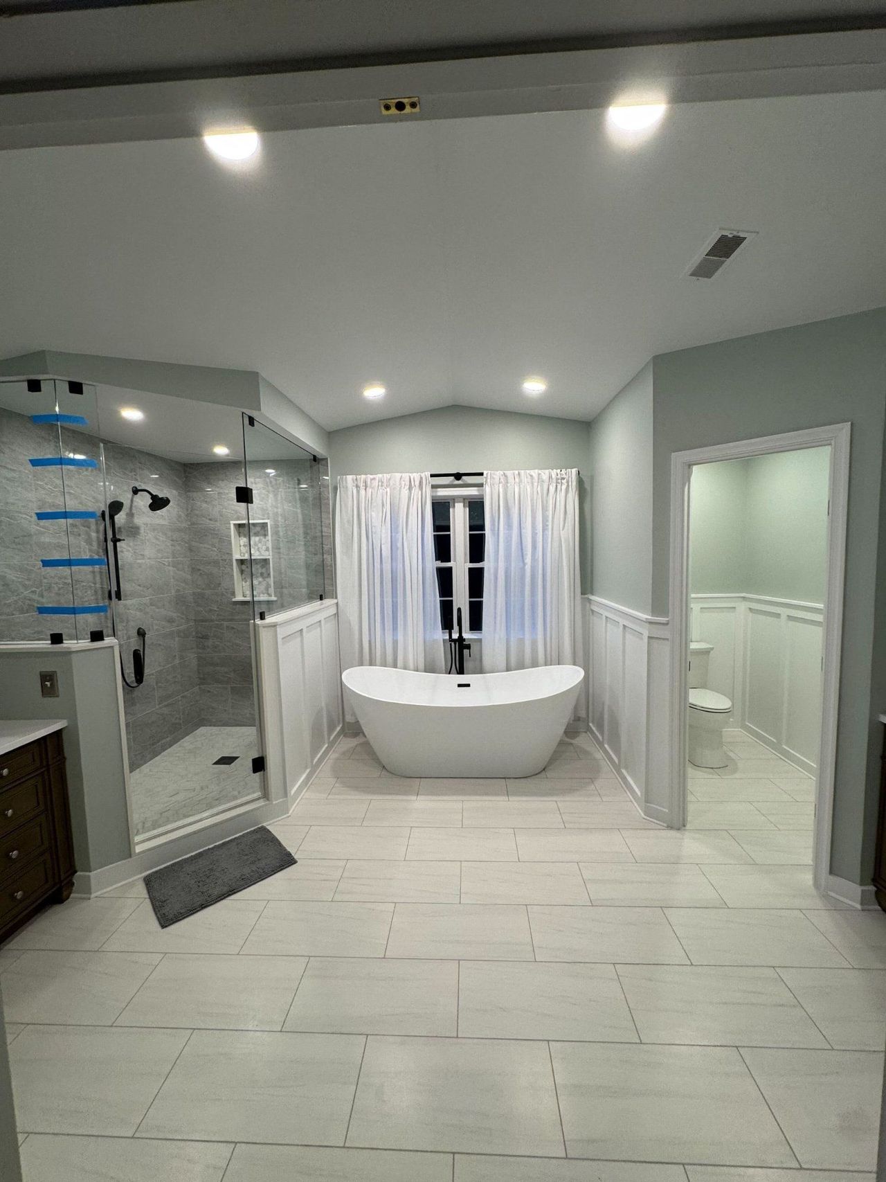 Remodeled primary bathroom in Sykesville, MD with freestanding tub and frameless glass shower – Sykesville, MD