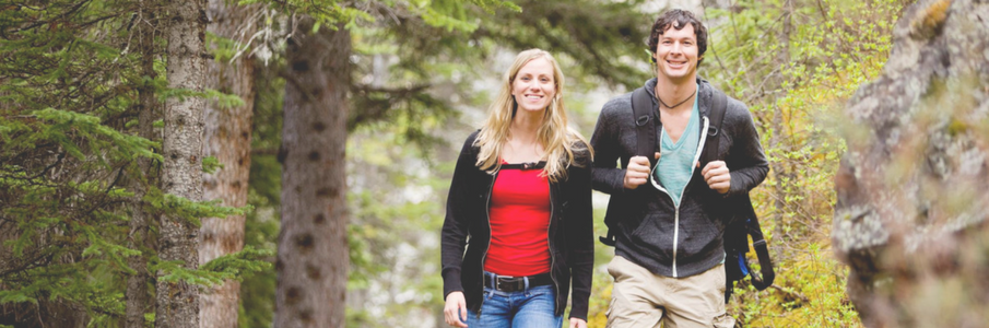 man and woman hiking
