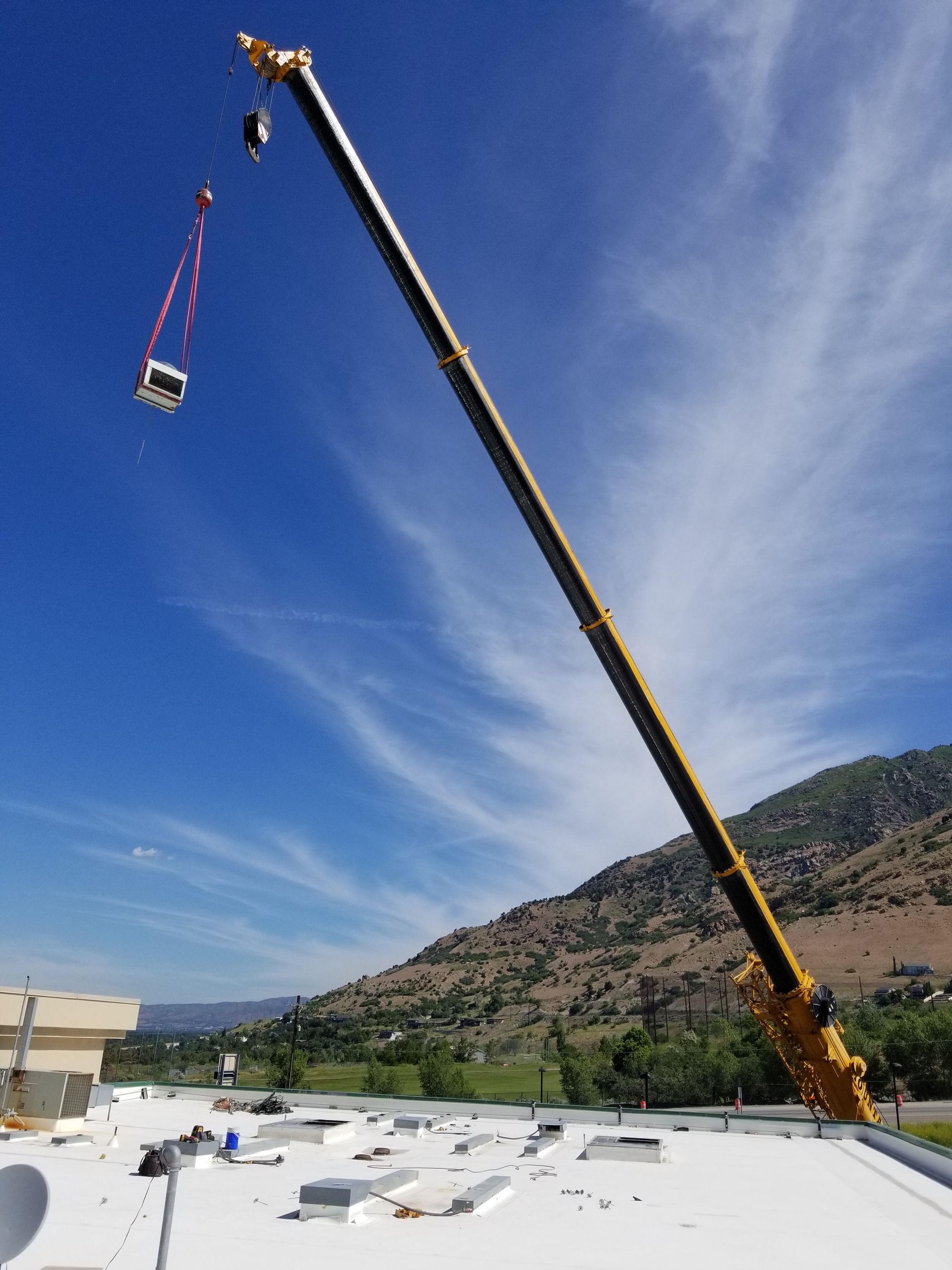 For industrial HVAC services in Wasatch Front, UT - Call Platinum Mechanical hard at work