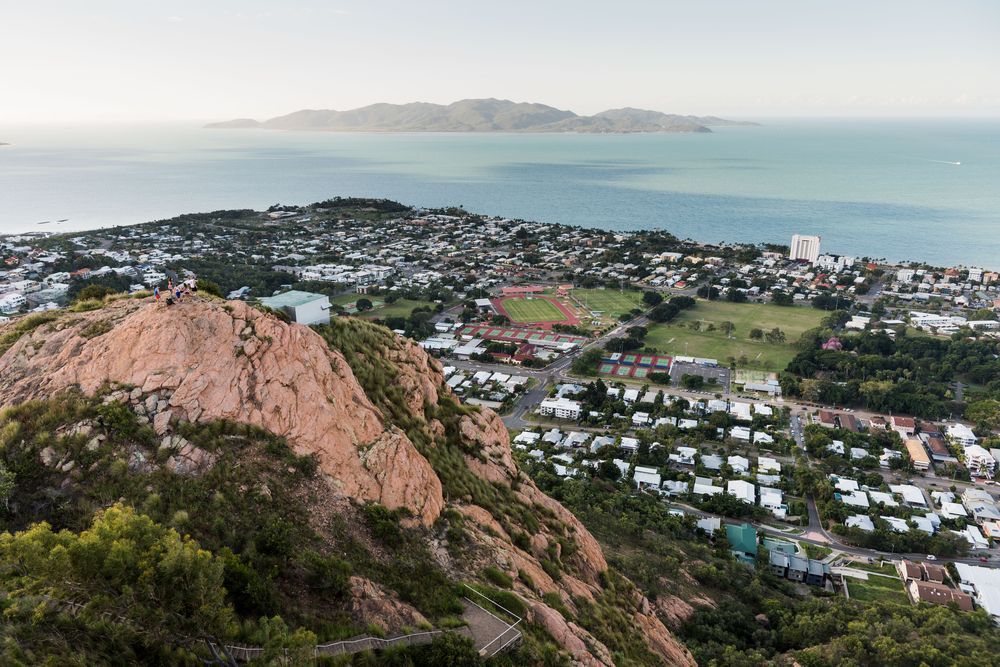 Aerial View of a Coastal Town With a Rocky Mountain, and Distant Islands — Active Airconz in Townsville, QLD