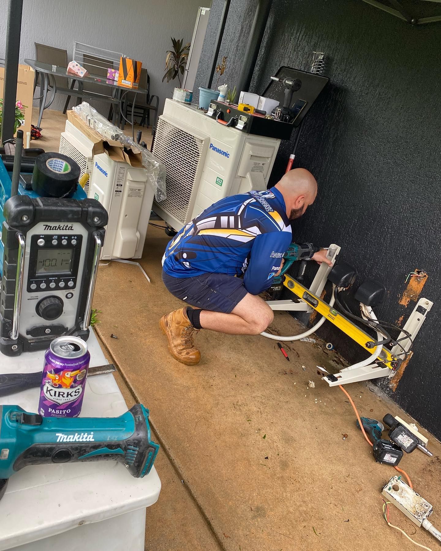 Man Installing Air Conditioner Unit — Active Airconz in Sunshine Coast, QLD