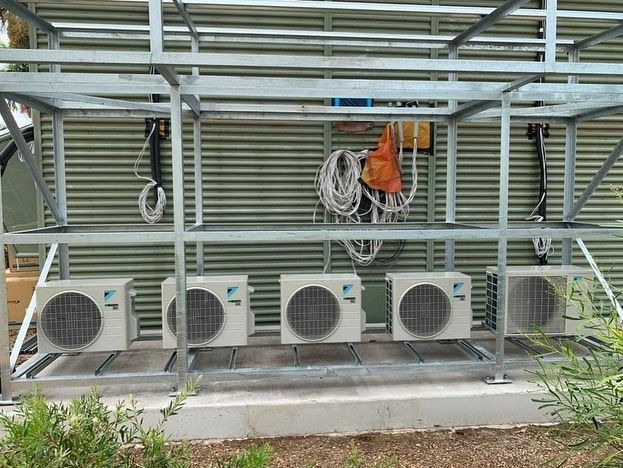 Air Conditioning Units Mounted on a Metal Rack — Active Airconz in Sunshine Coast, QLD