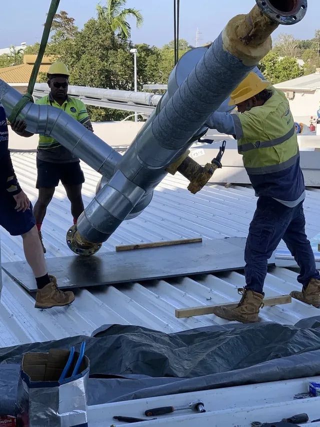 Active Airconz Employee Installing Tubes — Active Airconz in Yarrawonga, NT