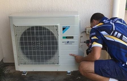 Technician Fixing The Air-condition Box — Active Airconz in Winnellie, NT