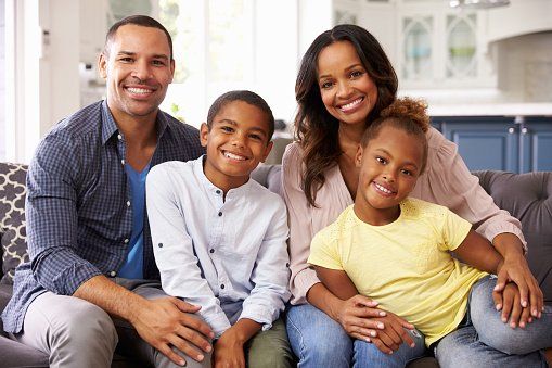 Happy family — Bankruptcy Attorney in Mobile, AL