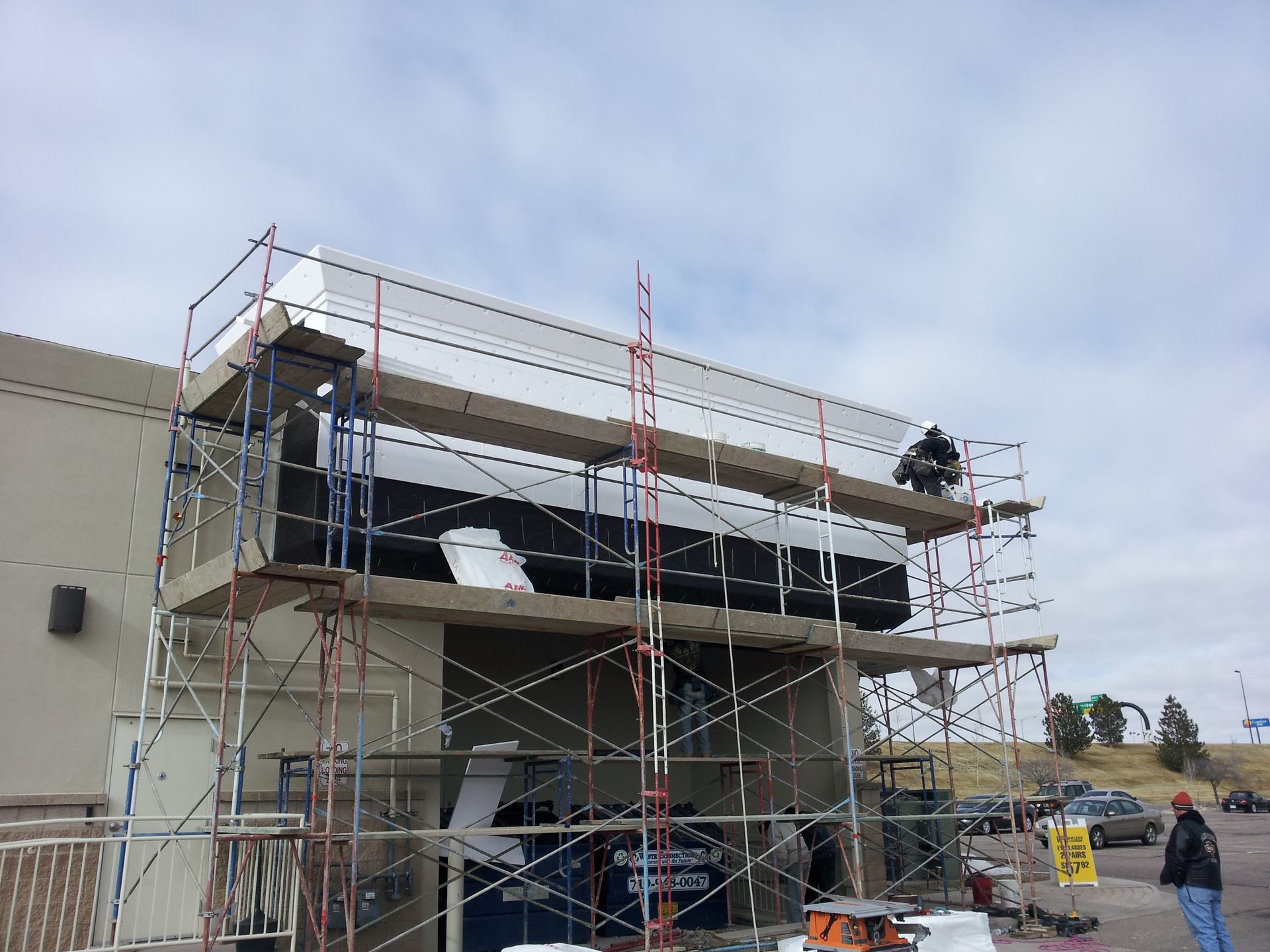 A building under construction with scaffolding on top of it