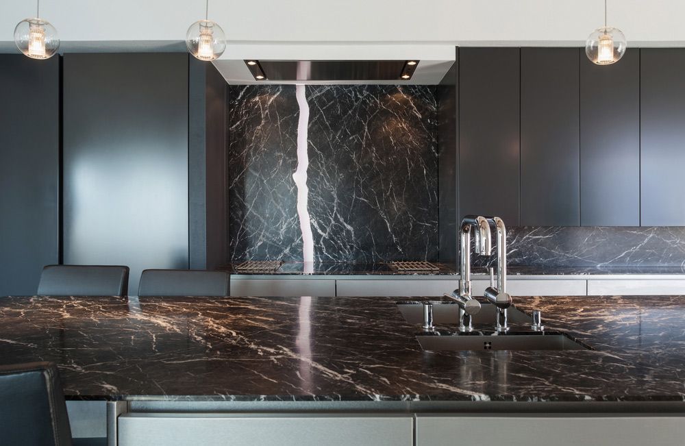A Kitchen With A Marble Counter Top And A Sink — Universal Marble & Granite In Scotts Head, NSW