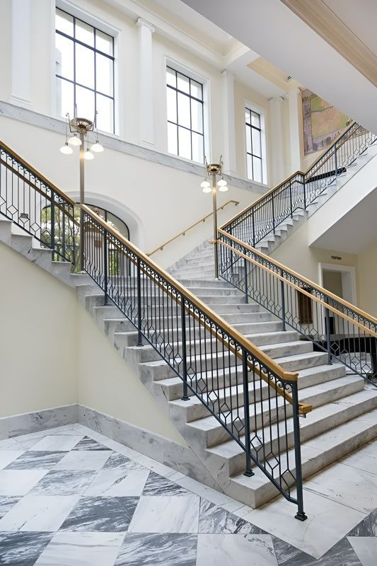 A Large Staircase With Granite Flooring In A Building — Universal Marble & Granite In Nambucca, NSW