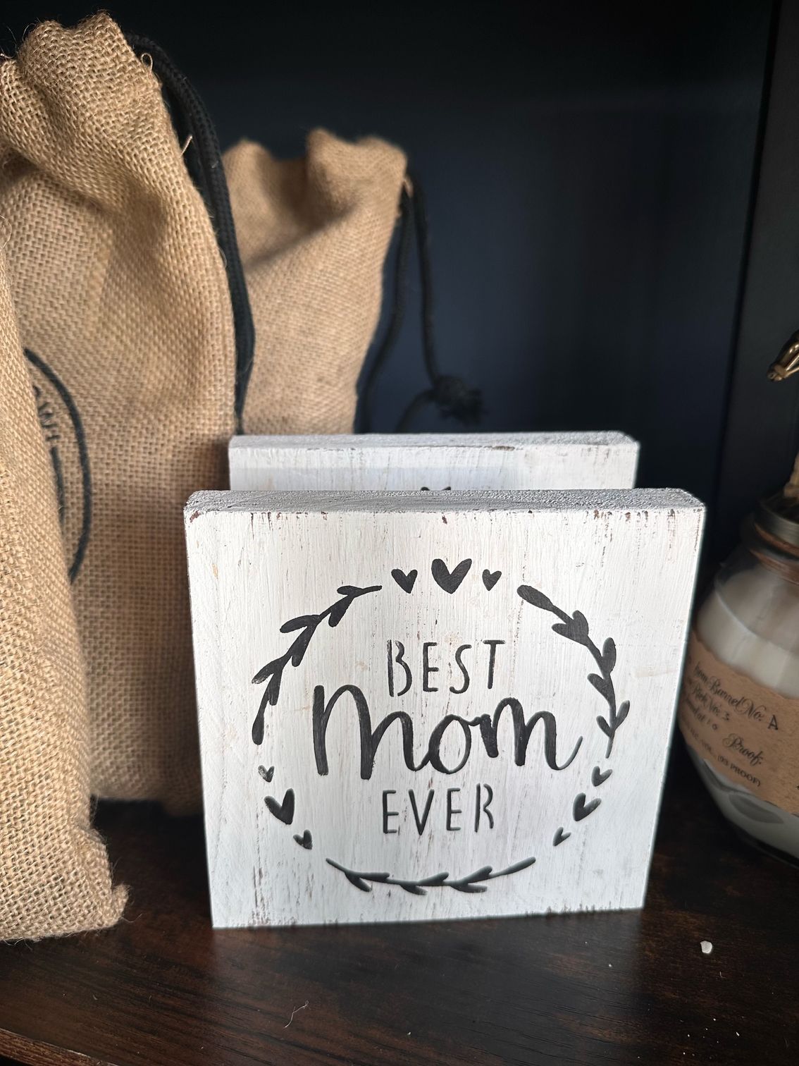 A wooden table with sustainable handmade gifts.