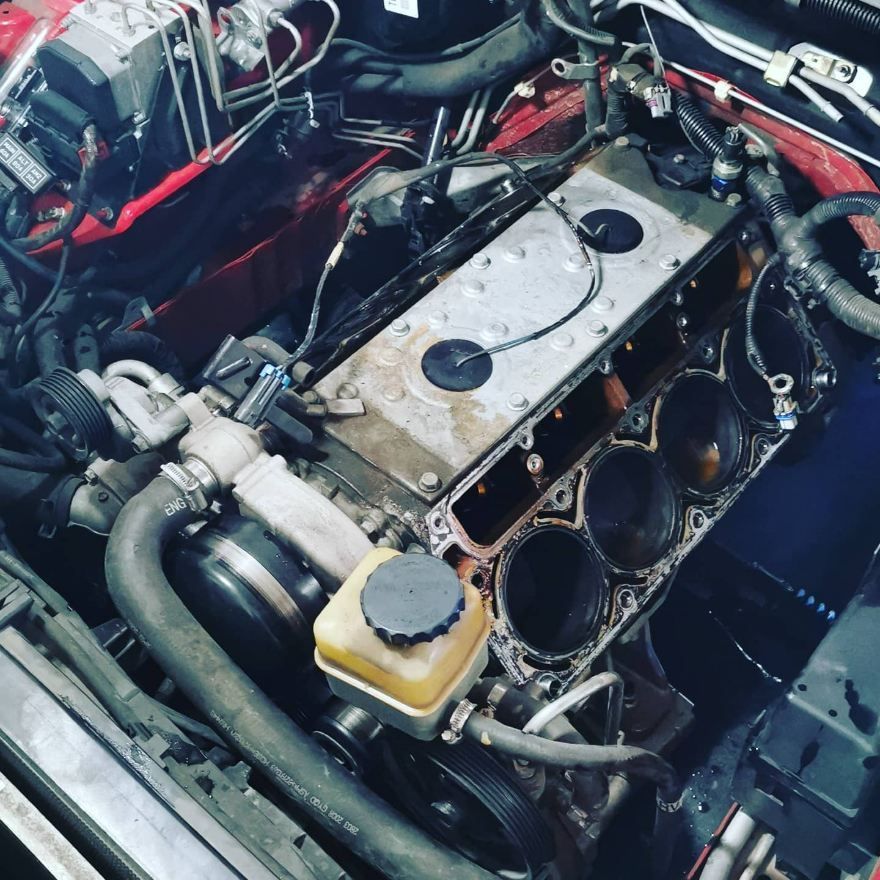 A Close Up of a Car Engine With a Black Cap on It — JJ's Garage In South Geelong, VIC