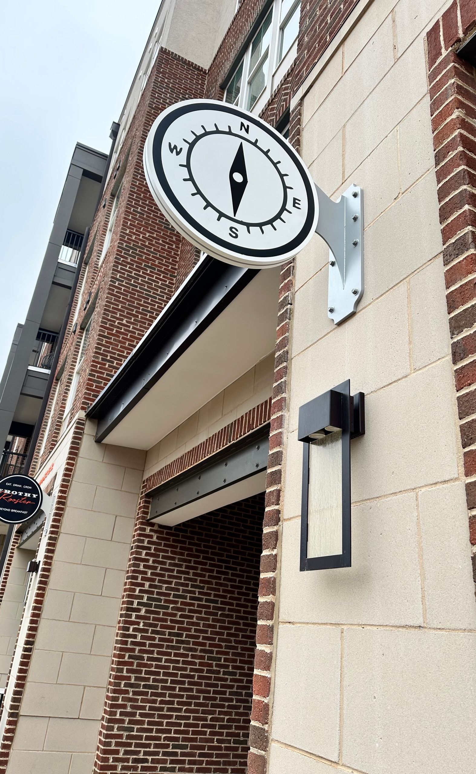 A clock on the side of a brick building