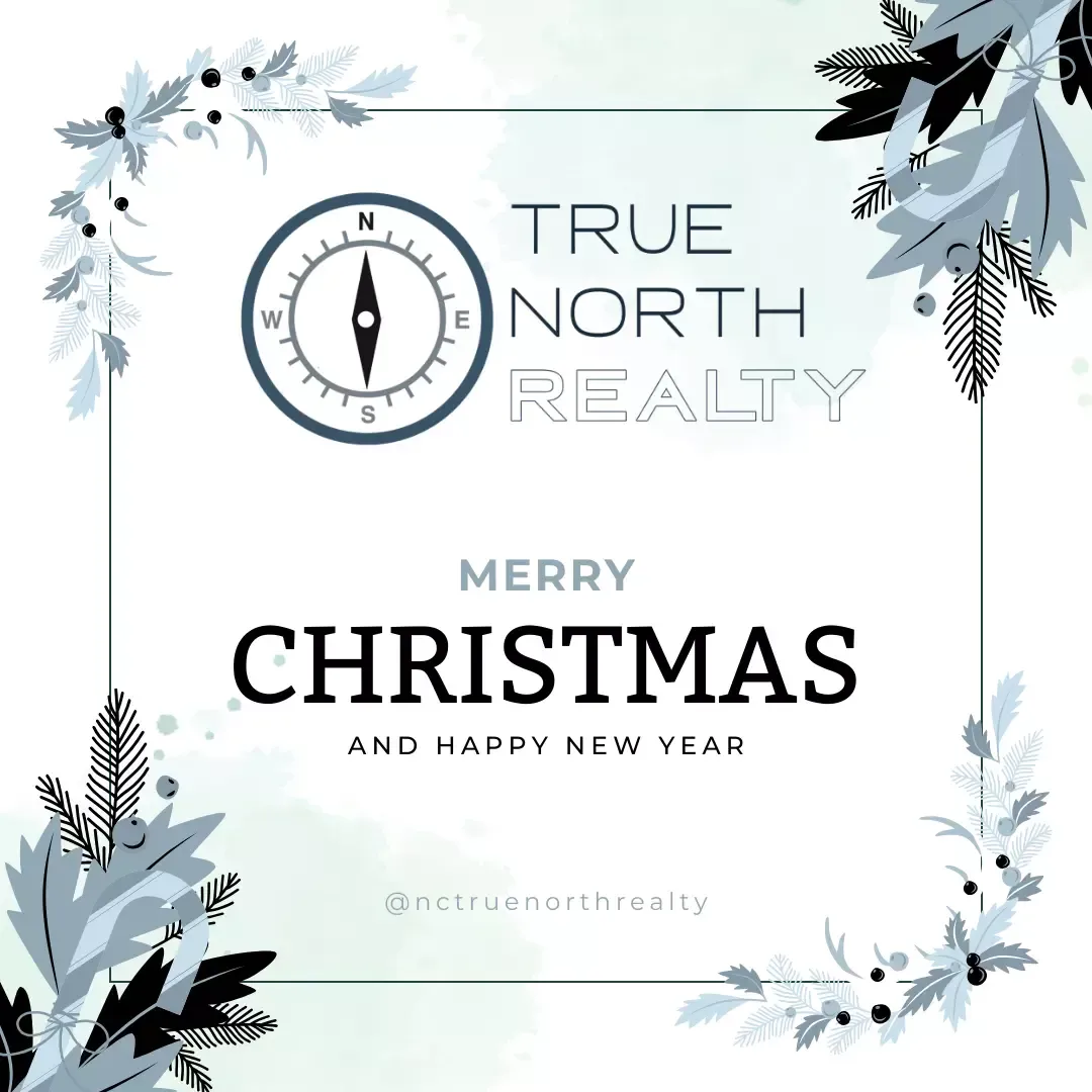 A christmas card for true north realty with a compass and leaves