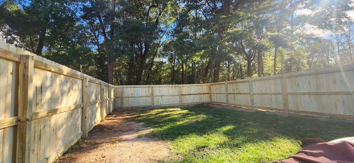 Wood fence installed by Martin's Seamless Gutters & Fencing