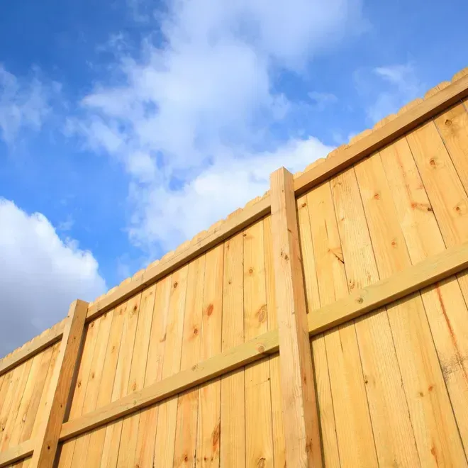 A large white house with a large porch and pillars