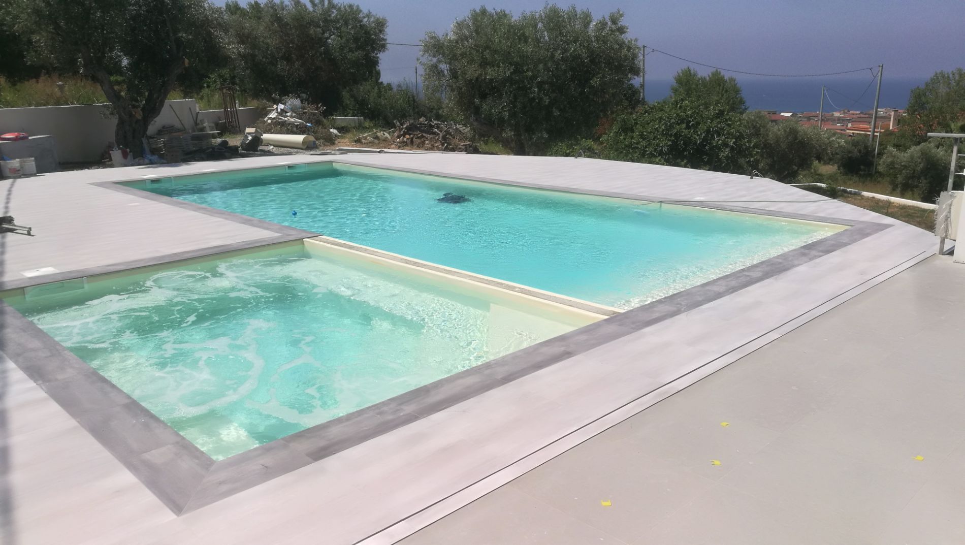 piscina interrata con due vasche