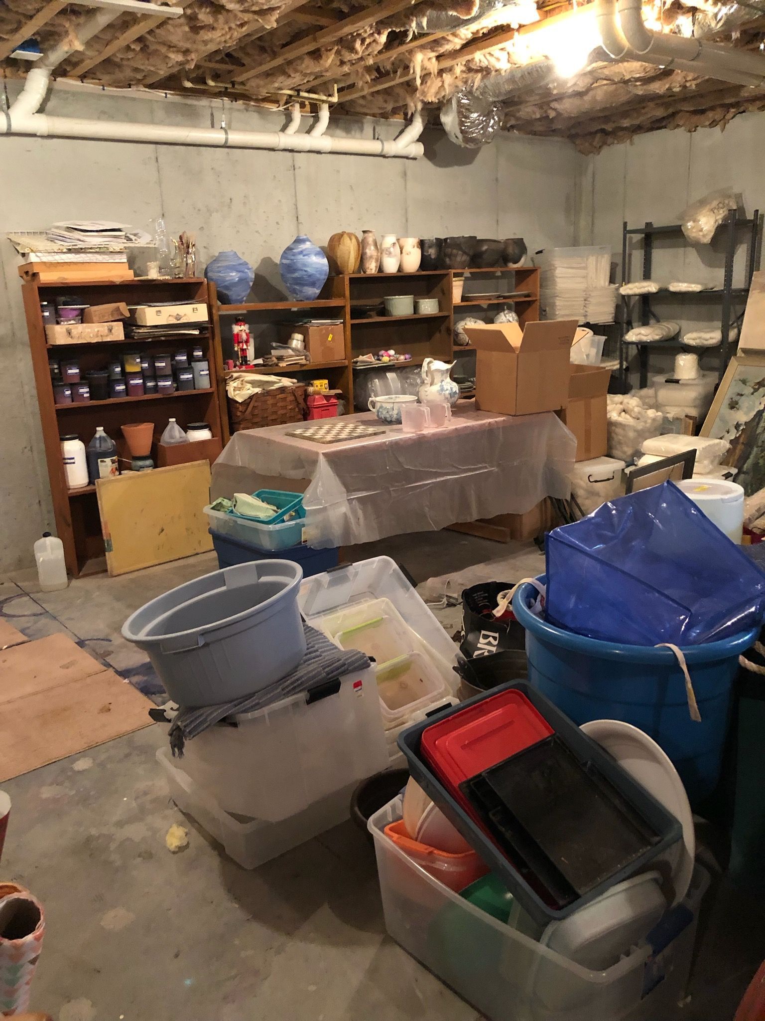 A room filled with lots of containers and shelves.