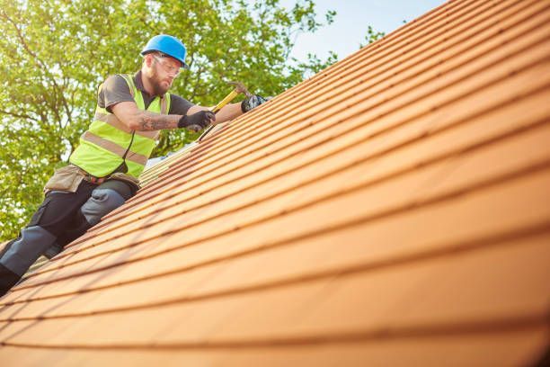 A clay plain tiled roof installation.