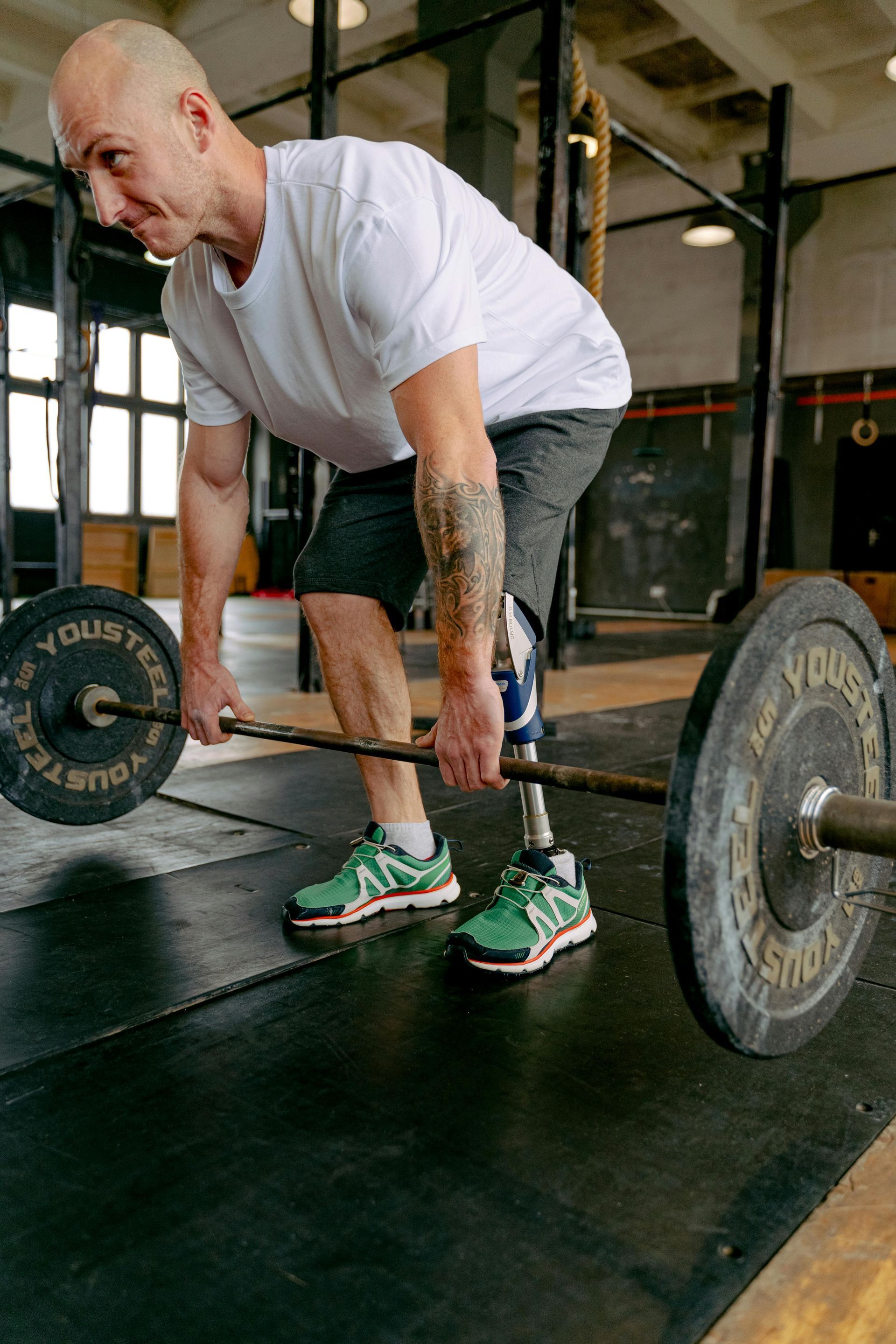 Man performing a deadlift.