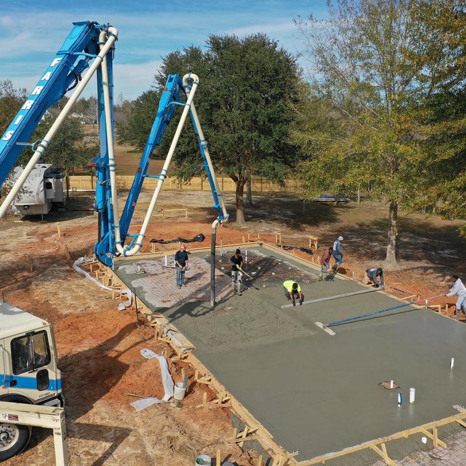 Construction Worker Plastering Cement — Biloxi, MS — C. Mason Concrete