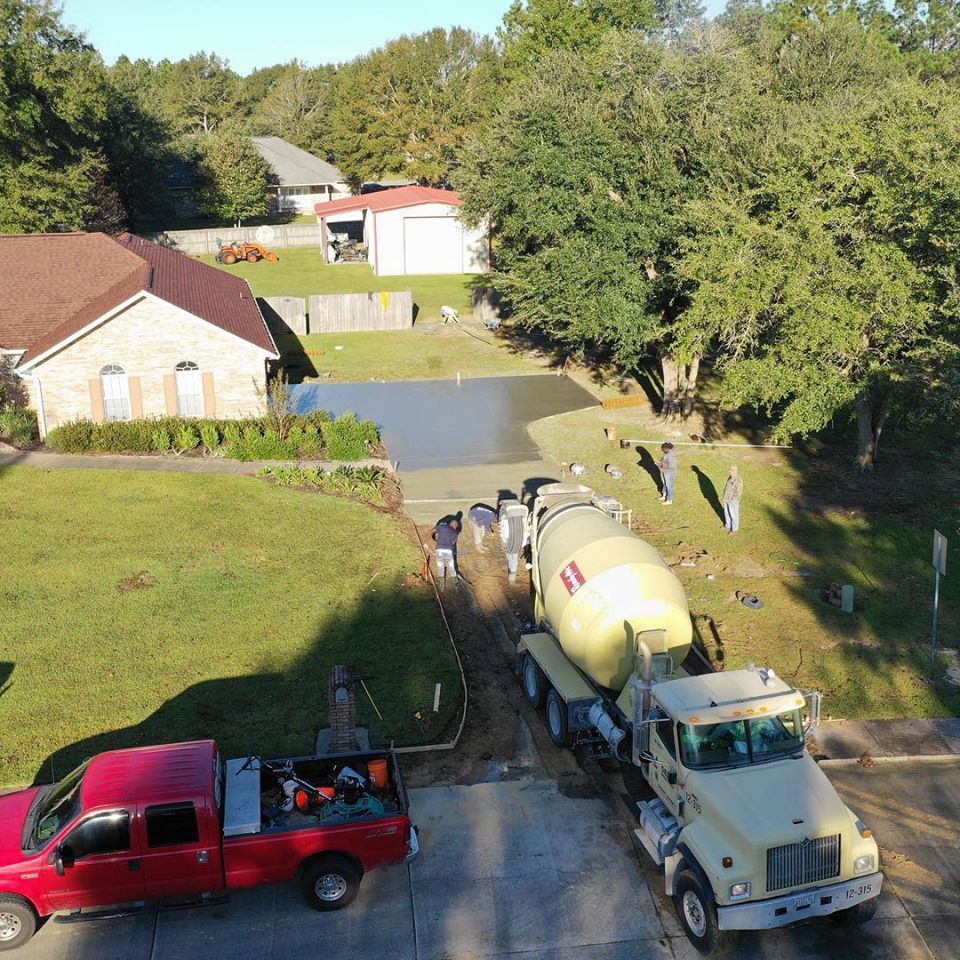 Mixer Truck Is Transport Cement Beside the House — Biloxi, MS — C. Mason Concrete