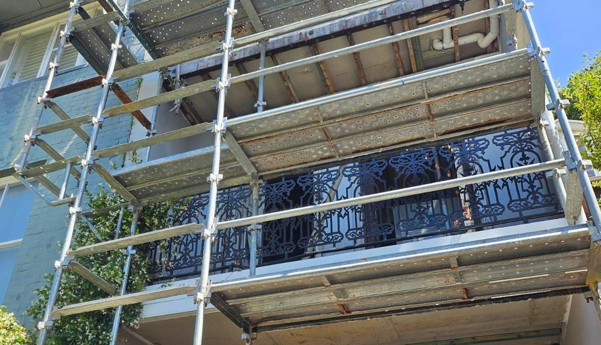 Scaffold setup on multi-storey terrace in North Shore Sydney for external building work.