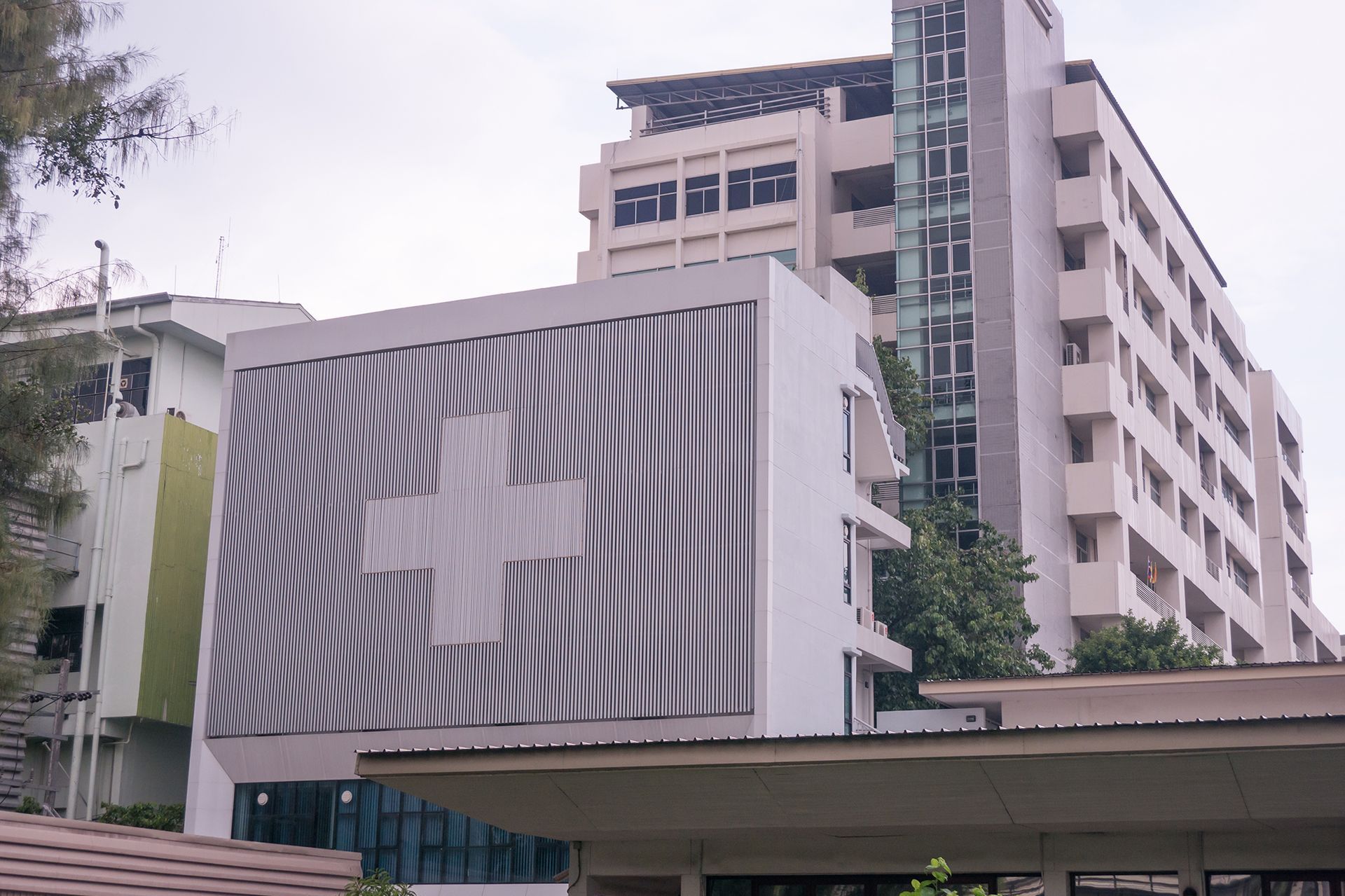 A large building with a cross on the side of it