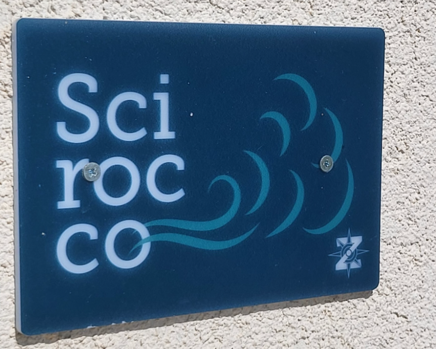 insegna camera scirocco