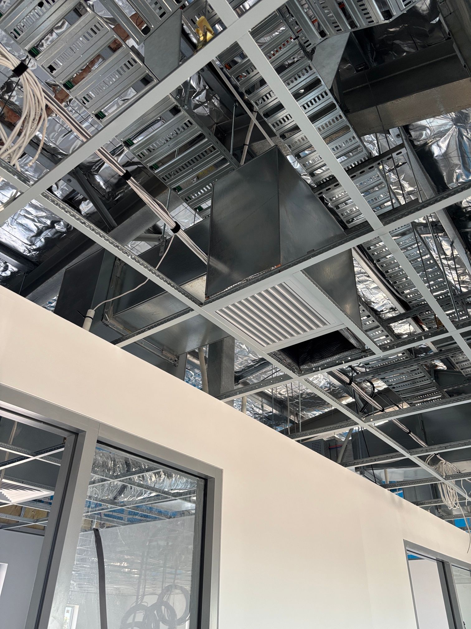 An Upward-angle Shot of a Commercial Ceiling Under Construction — Active Airconz in Winnellie, NT