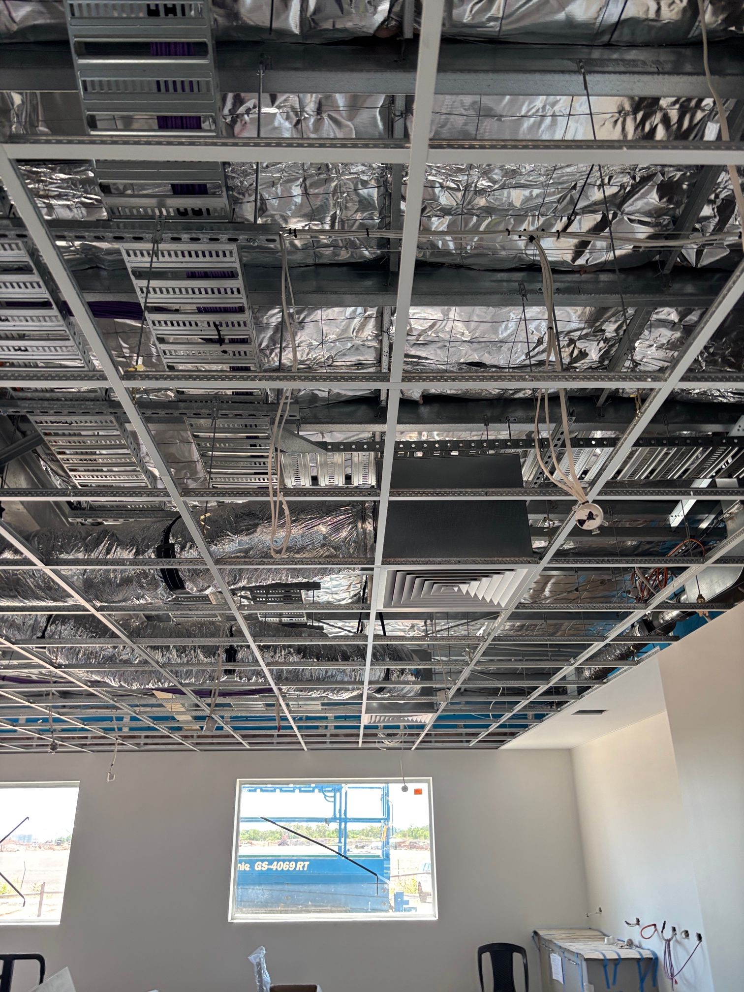 Indoor Construction Site With an Exposed Ceiling Grid — Active Airconz in Winnellie, NT