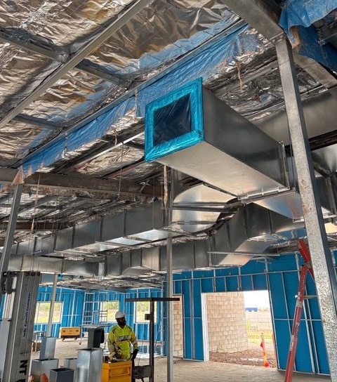 An Indoor Construction Site Shows a Large, Rectangular Metal HVAC — Active Airconz in Winnellie, NT