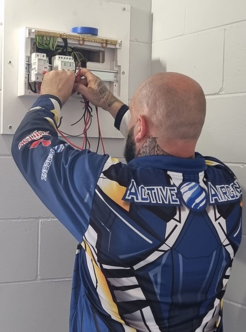 Electrician Working on Electrical Panel — Active Airconz in Nhulunbuy, NT