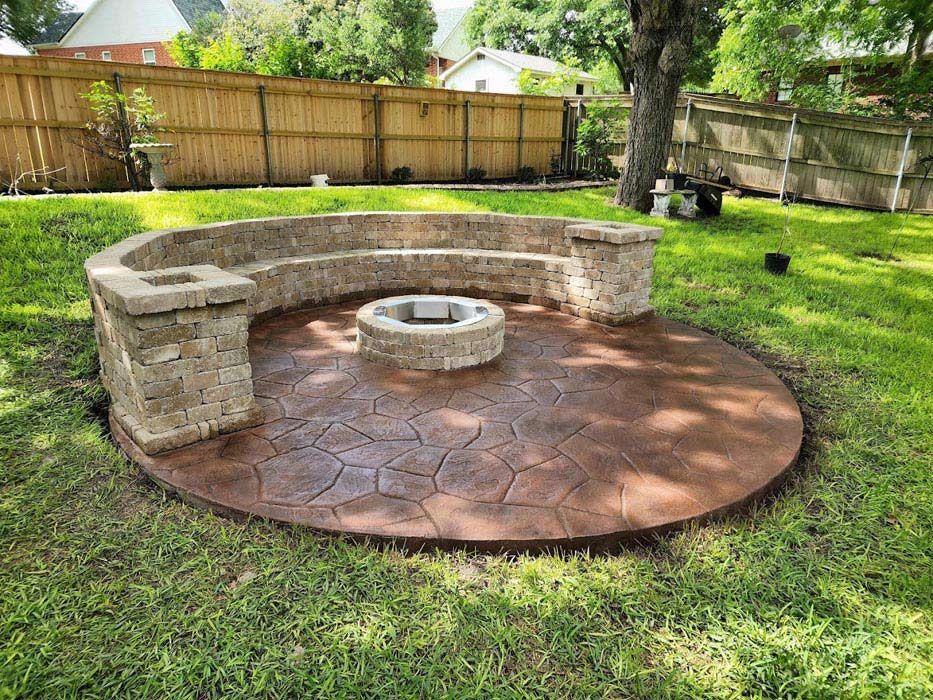 There Is a Fire Pit in The Middle of The Backyard