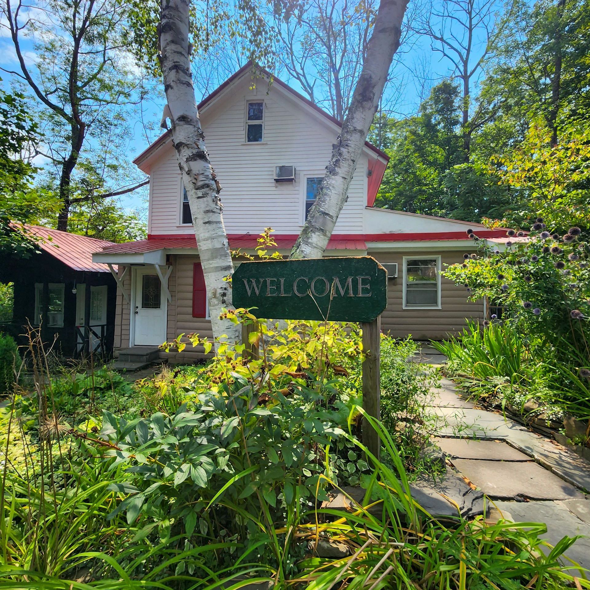 Exterior of Belleayre Lodge's welcome center, with a 
