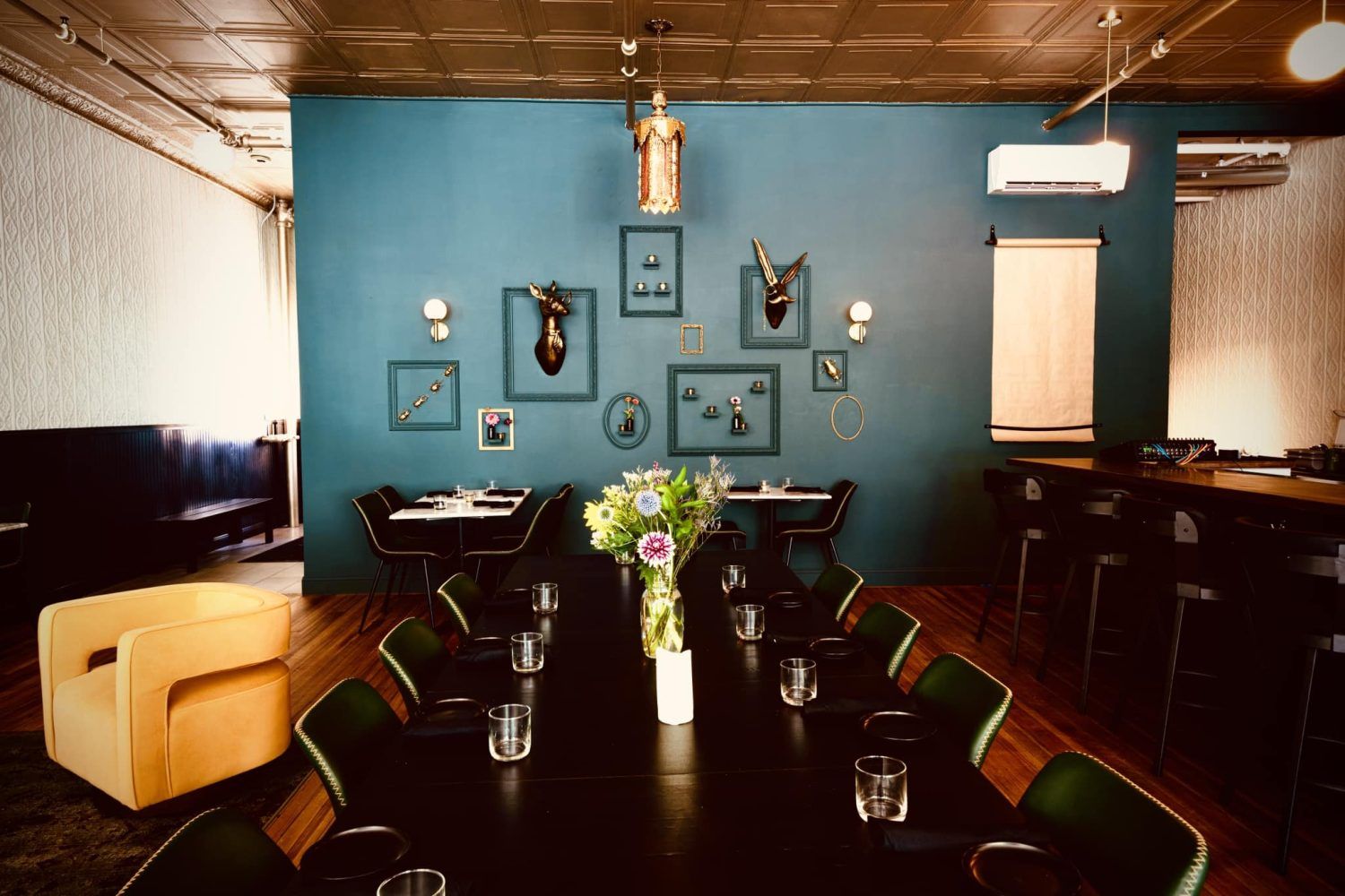 Interior of a restaurant with tables and chairs.
