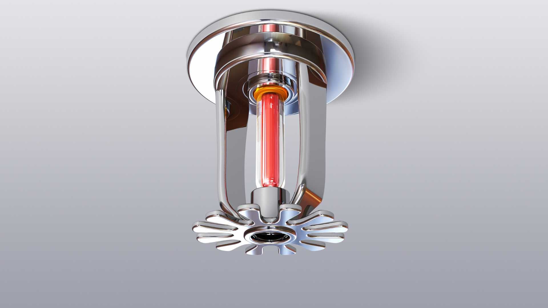 A fire sprinkler with a red light coming out of it