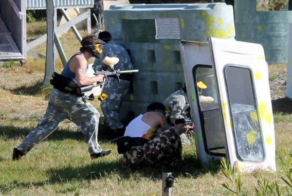 paintball players in the heat