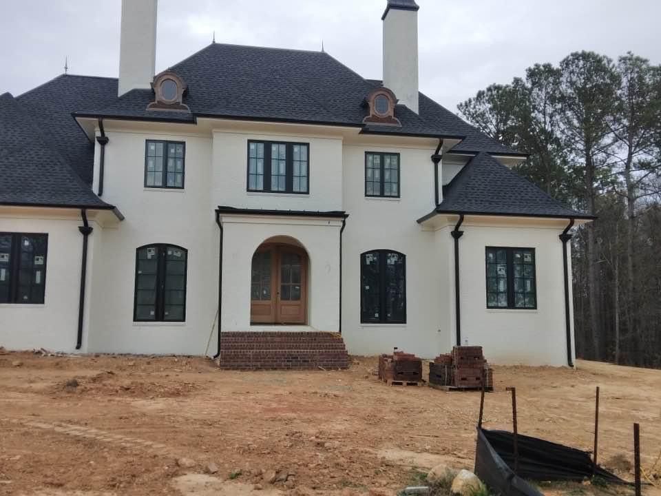 Black Gutter Pipes — Charlotte, NC — Wade H Helms Guttering