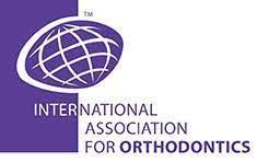 International Association for Orthodontics logo: purple and white globe with text.