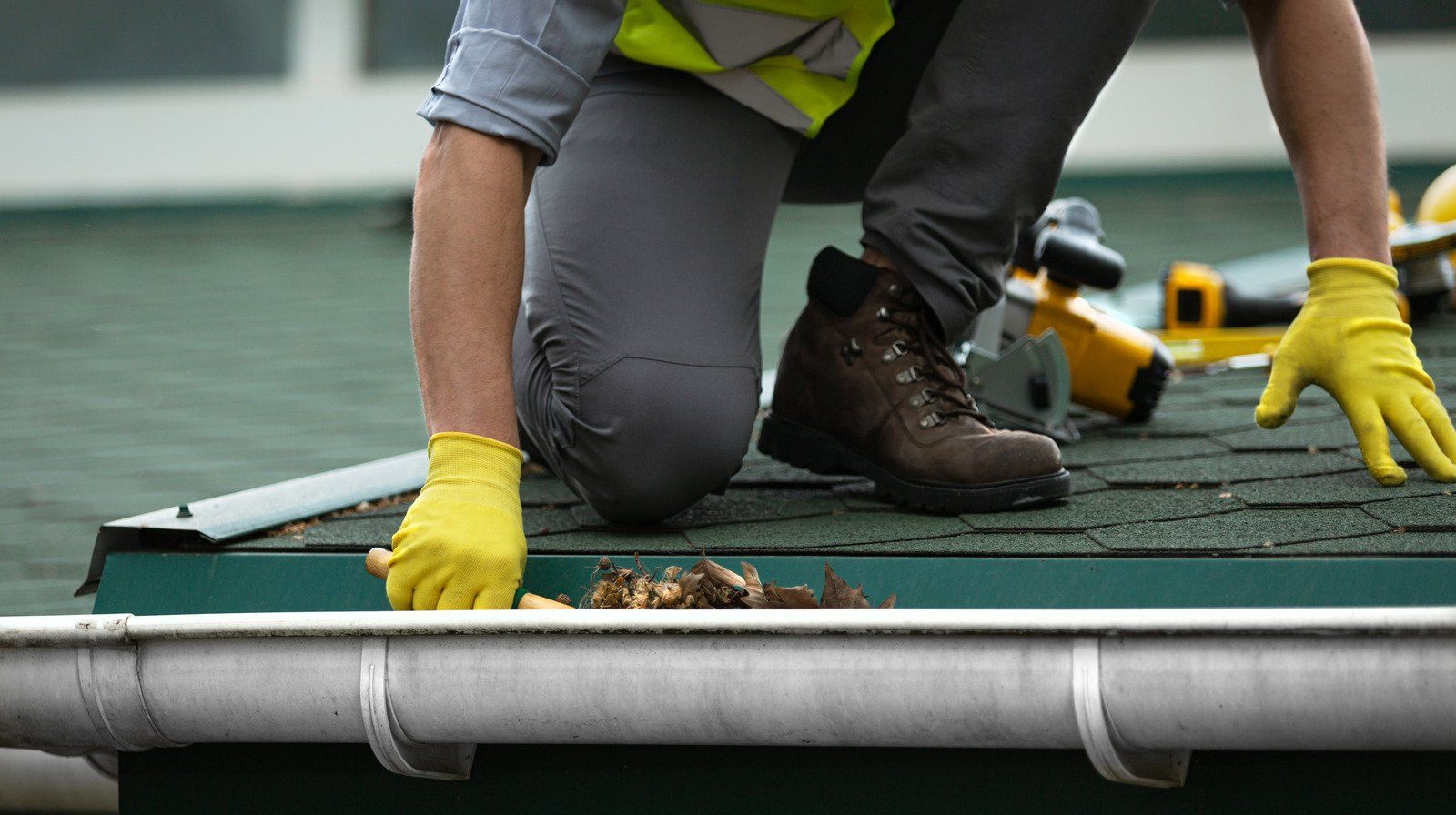 A wooden fence with a gate attached to it.