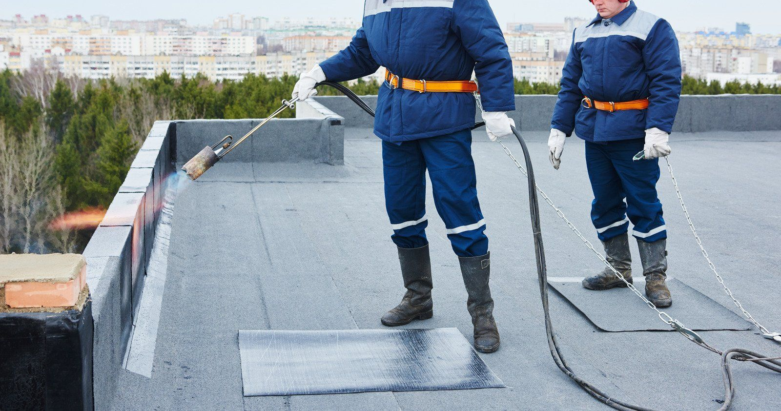 A wooden fence with a gate attached to it.