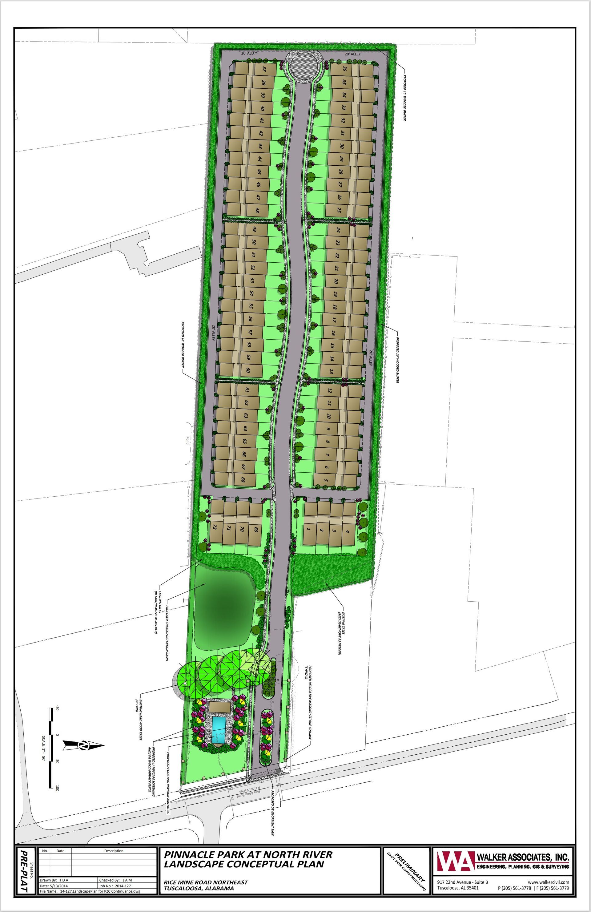 Overhead view of a planned residential area with rows of houses, a road, landscaping, and a small pool area.
