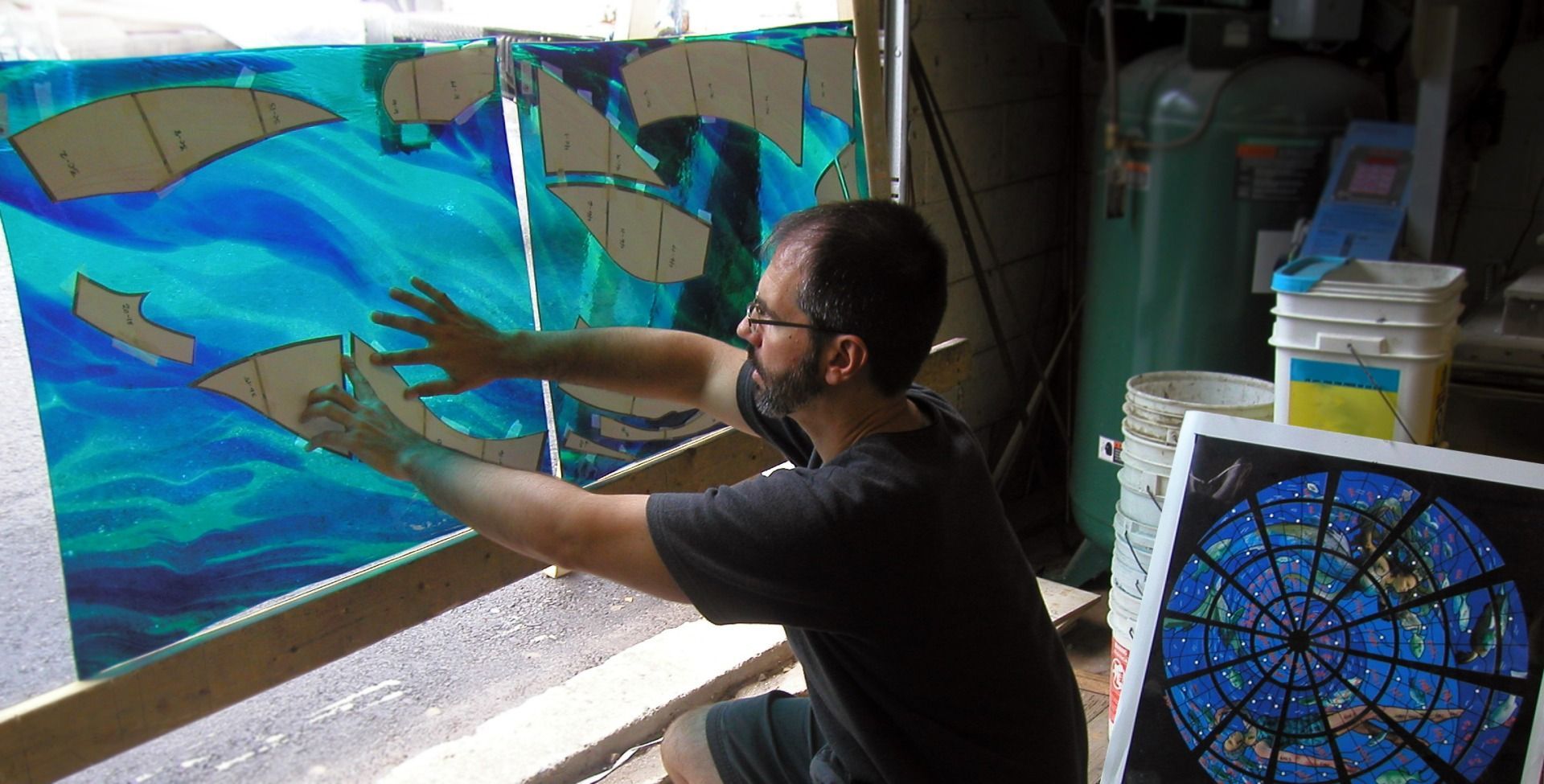 A chair with a yellow pillow and a necklace on it