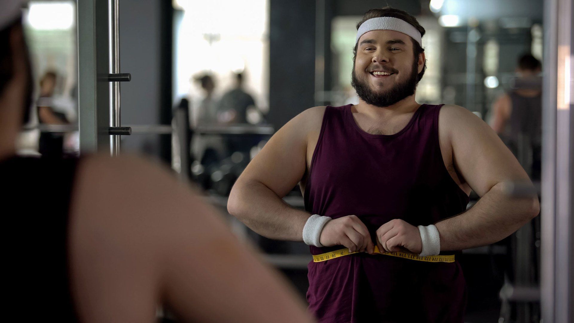 Man Measuring Fat Waist — Hampton, VA — Doctors Weight Loss Clinic