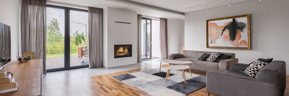 Spacious Living Room with Floor Panels and Curtains — Blinds in Bogangar, NSW